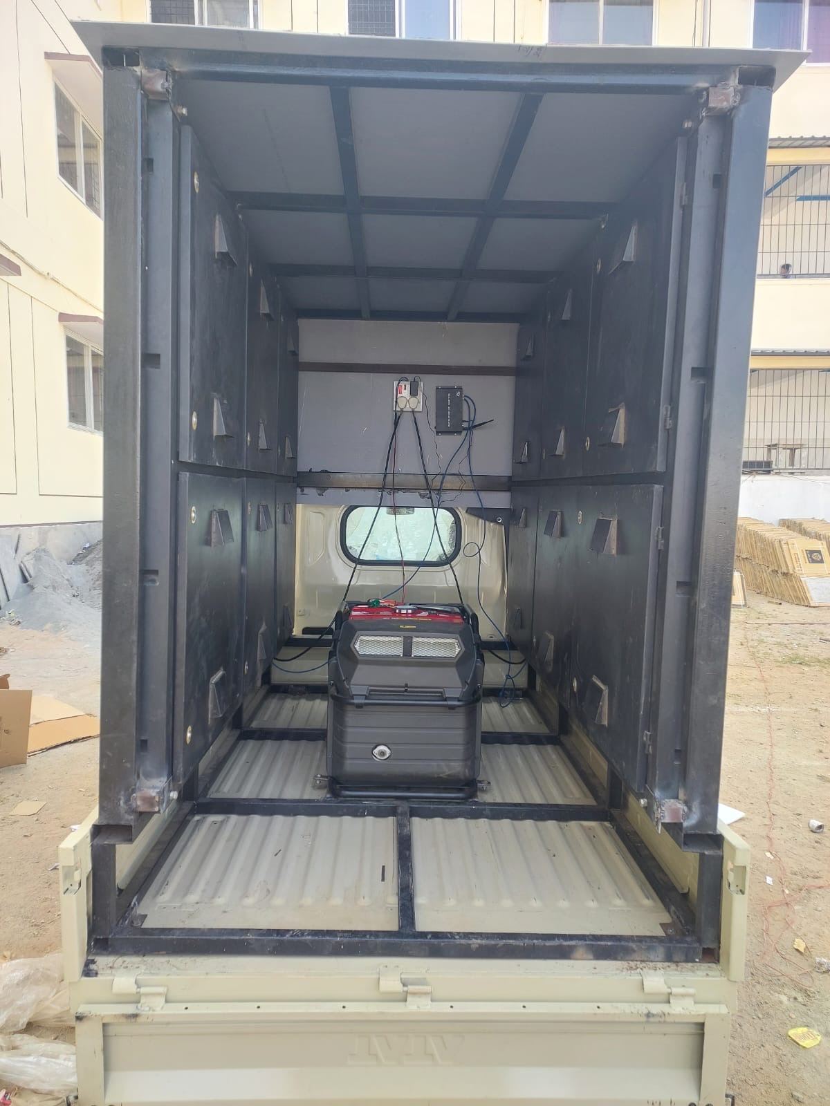 Fabricated steel structure and wiring inside a mobile LED van